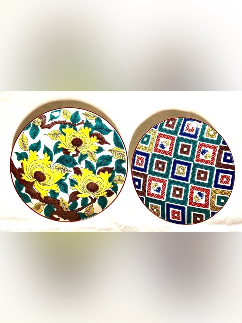 2 Kutani Ware Round Porcelain Plates. Kutani started in Japan in the mid 1700s.